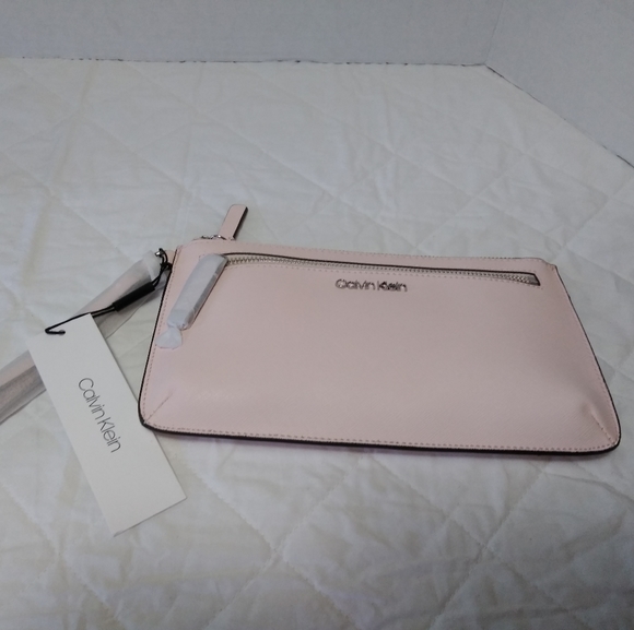 Calvin Klein Handbags - Calvin Klein Powder Pink Large Saffiano Wr…
